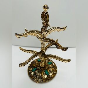 Vintage earring holder, gold plated with green cabochons & clear stones.